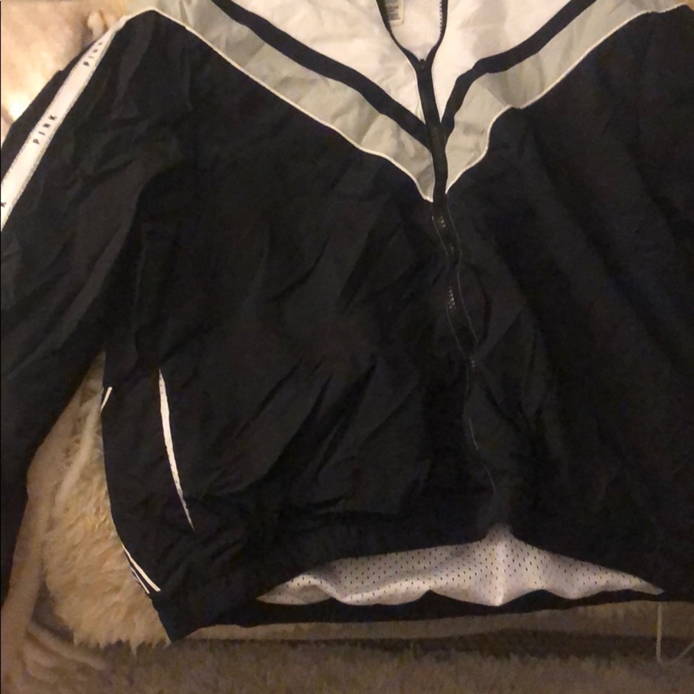 PINK windbreaker. Black and white.